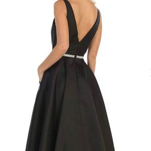 May queen black elegant gown.